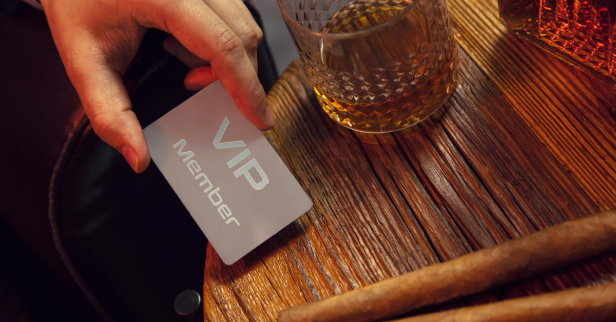 VIP member card with whiskey and cigars — representing premium restaurant loyalty programs and exclusive guest perks