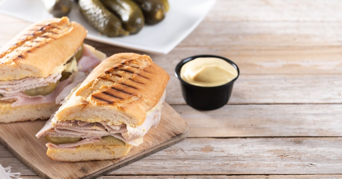 Traditional Cuban sandwich on wooden table