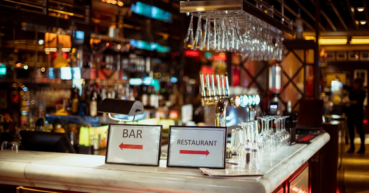 Bar and restaurant interior showing organized service areas — symbolizing efficient restaurant operations, staff workflow, and guest experience management.
